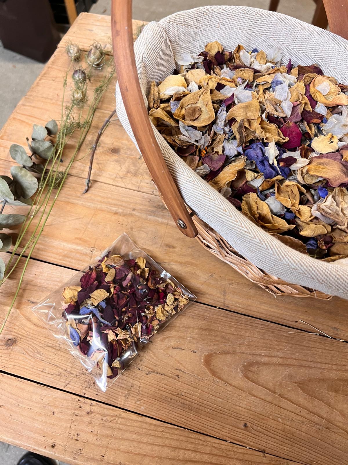 Borrowed Light dried confetti in a basket and in a small clear packet