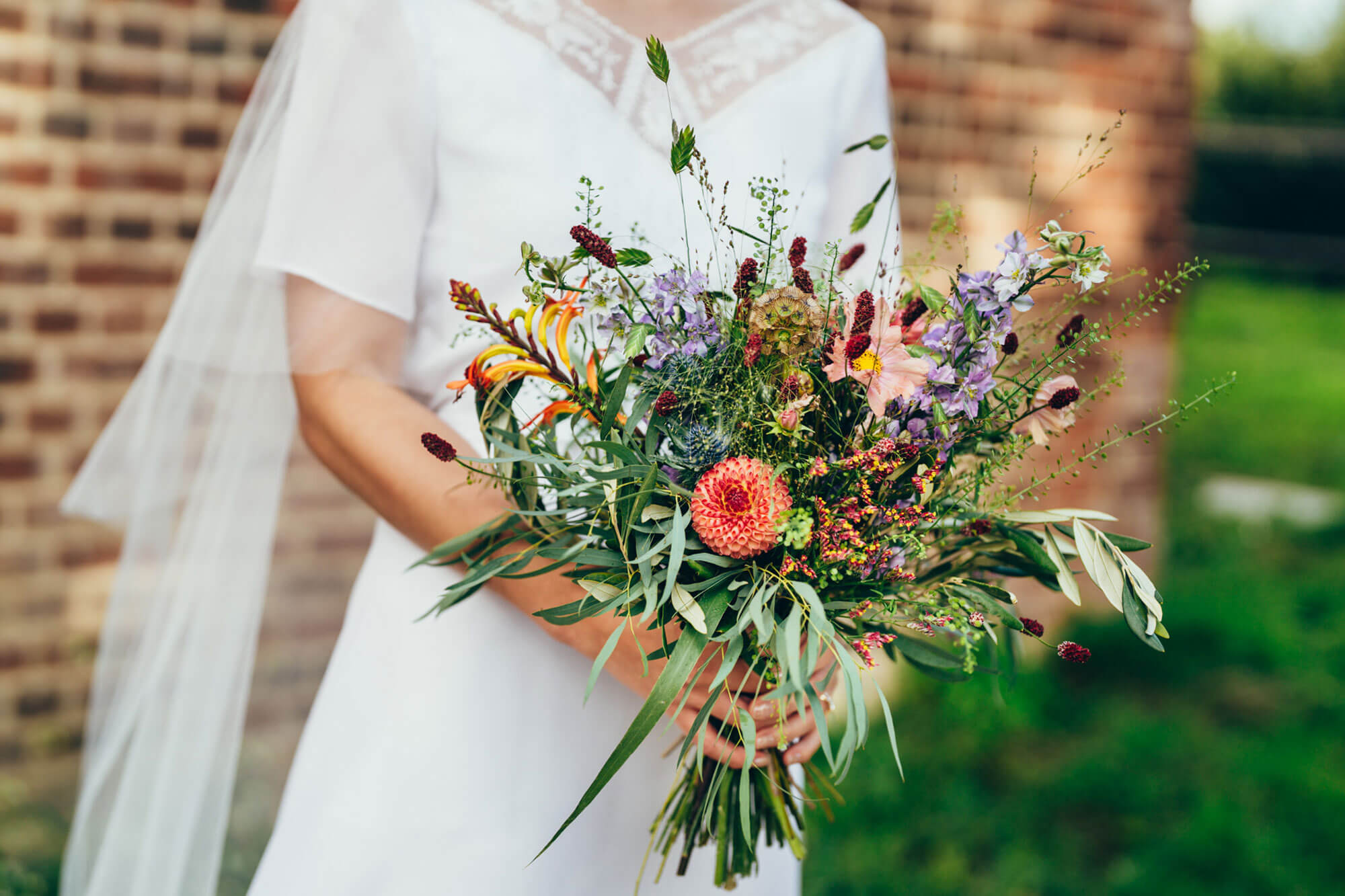BLFS bridal bouquet of wild grasses dahlia delphinium eucalyptus and olive. green with autumn colours and pop of lilac